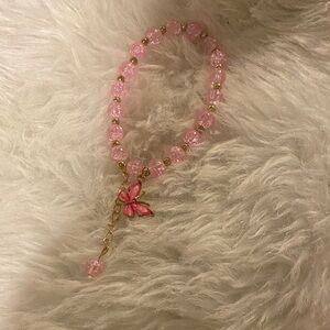 Pink Beaded handcrafted Bracelet with Butterfly Charm